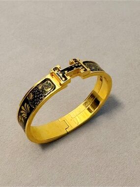 Hermès Gold and Black Les Leopards Enamel H Cuff Bracelet